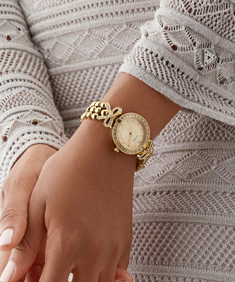 Guess Women’s Gold-Tone Bow Accent Crystal Watch – Model GW0838L2